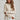 Women's knitted sweater with a round neck and long sleeves