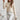 Women's knitted sweater with a round neck and long sleeves